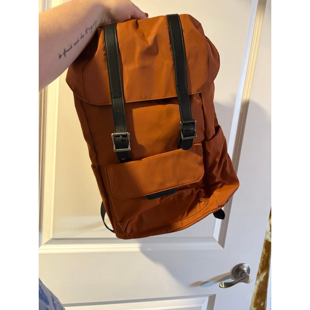 Open Story Fitted Flap Backpack in the color Amber Brown